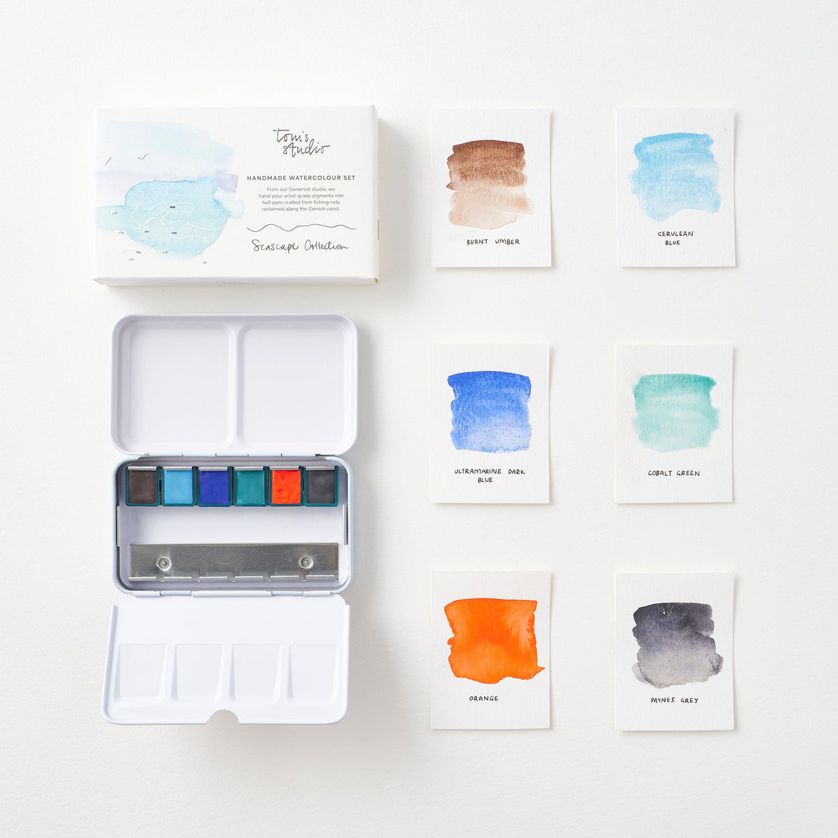 Conjunto de aquarelas Seascape da Tom’s Studio, com estojo aberto e amostras das seis cores
